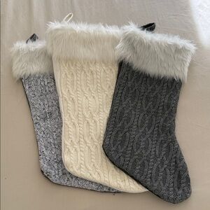 Set of Three Knit Christmas Stockings with Faux Fur Trim